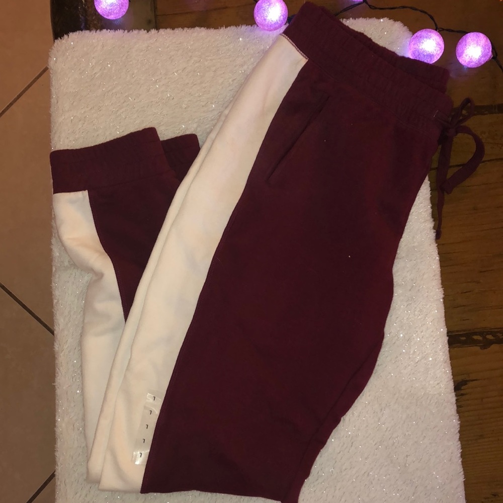 Never worn joggers, burgundy with white stripe